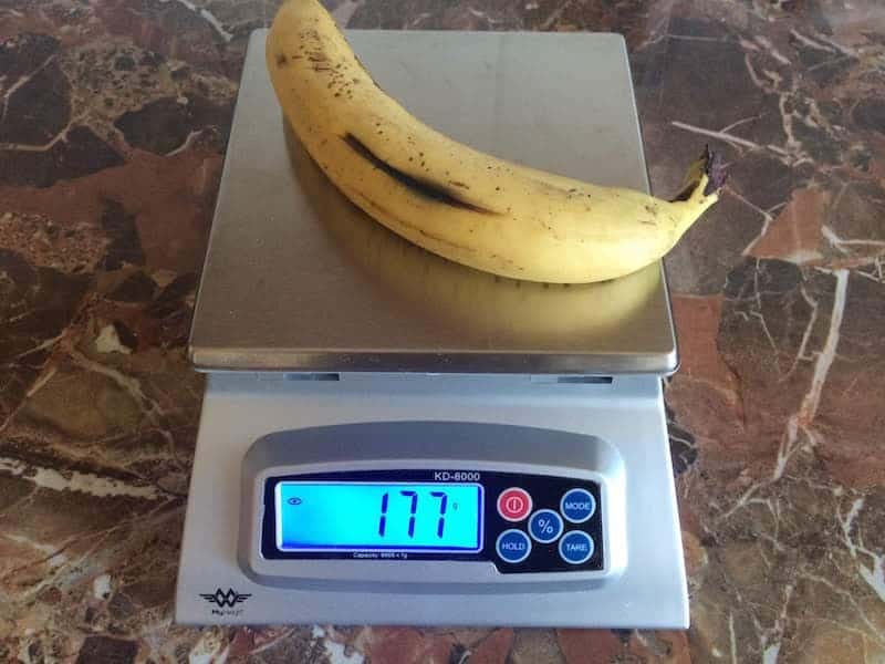 Kitchen scale with banana on table