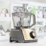Food processor on white kitchen table