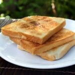 Toast bread slices on white plate
