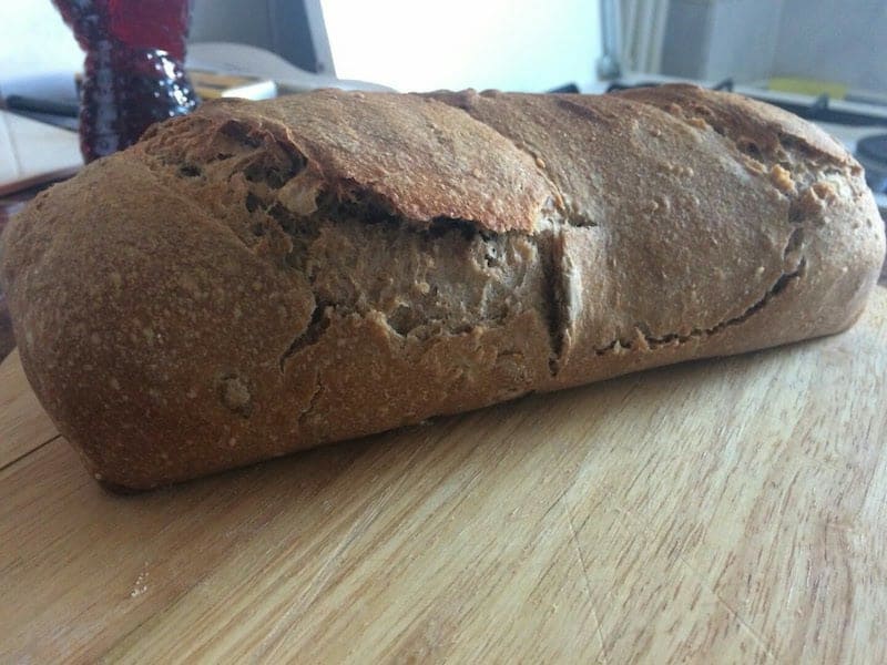 My first bread loaf - A disaster, bad shape and bad scoring