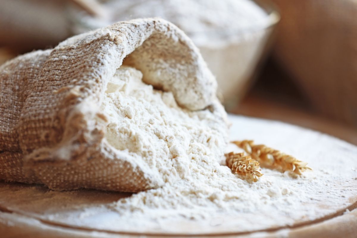 Spilled flour on table from flour bag