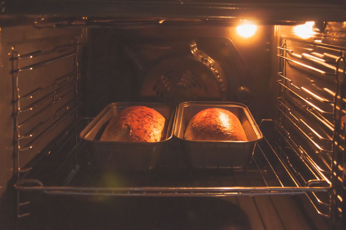 Loaves of bread in oven