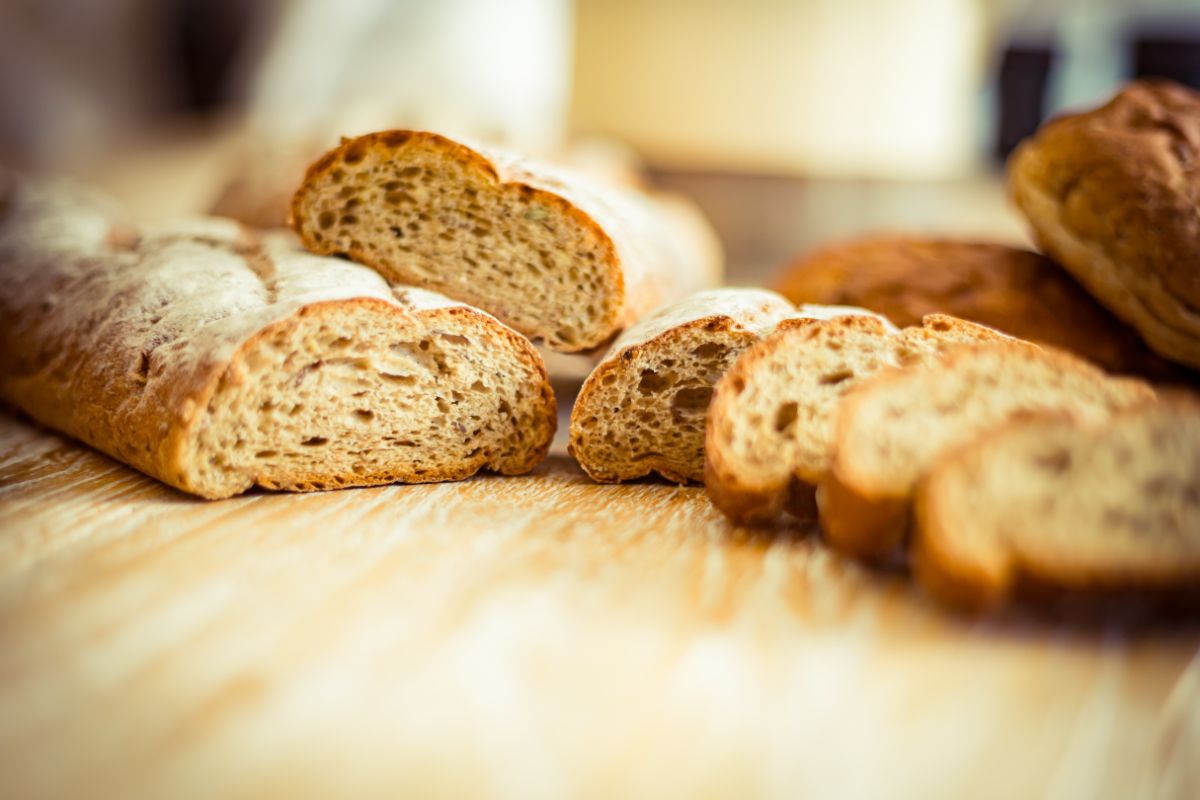 Slices of ezekiel bread on wooden table