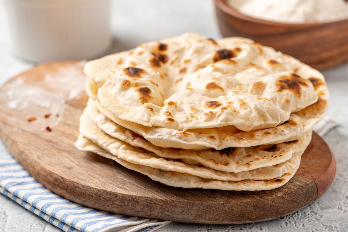 Flatbread on wooden pad