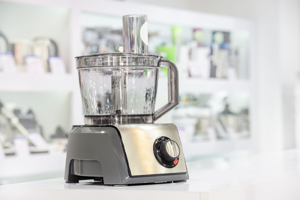 Food processor machine on white kitchen table