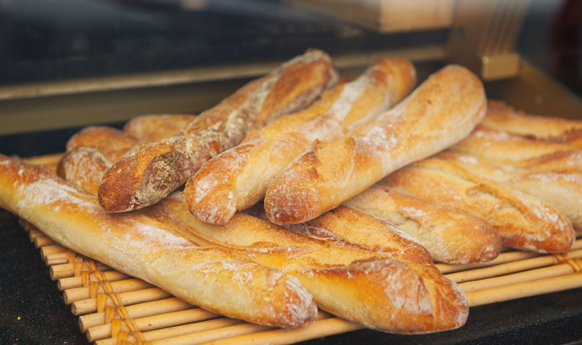 French baguettes on wooden rack