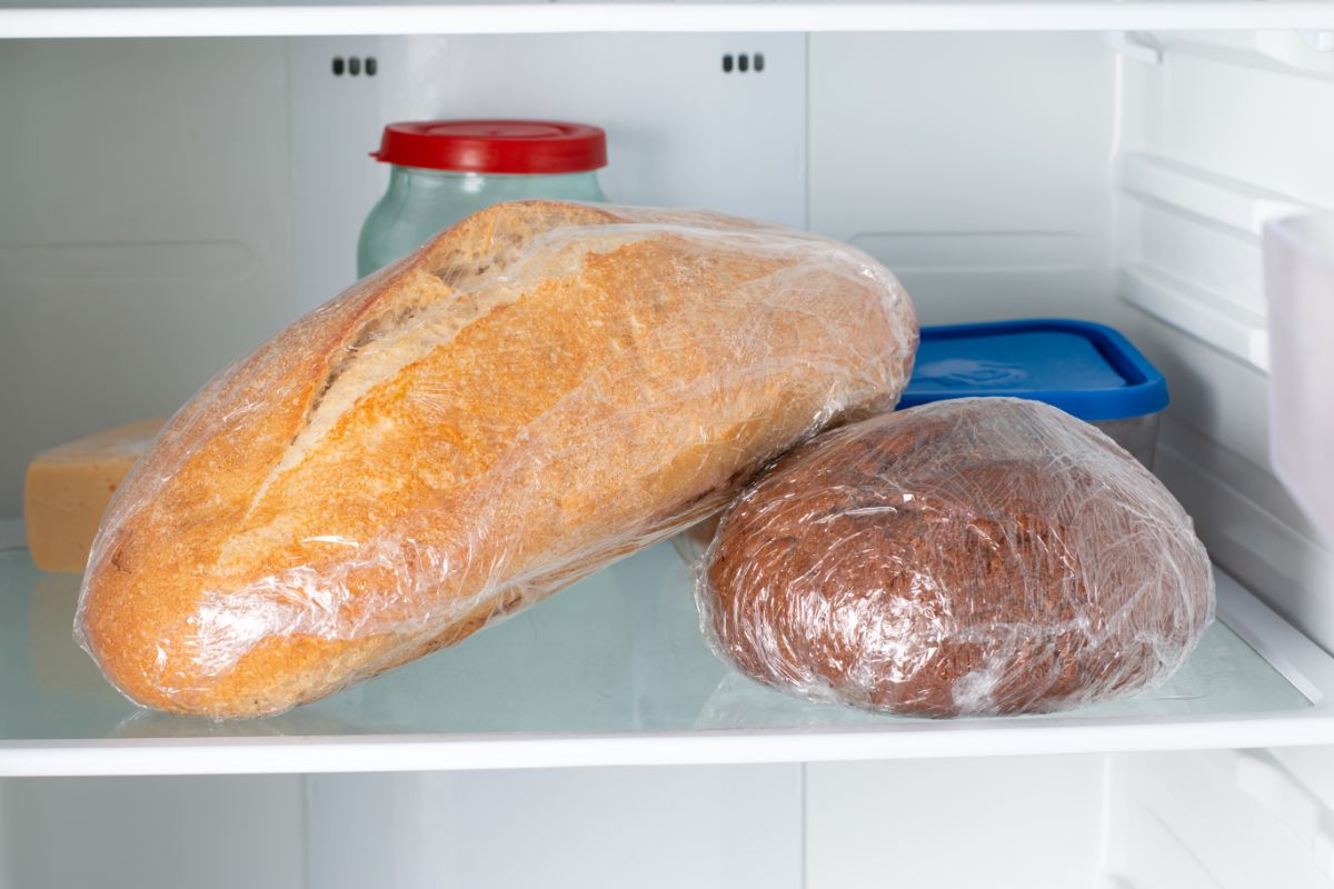 Loaves of bread in plastic bags in freezer