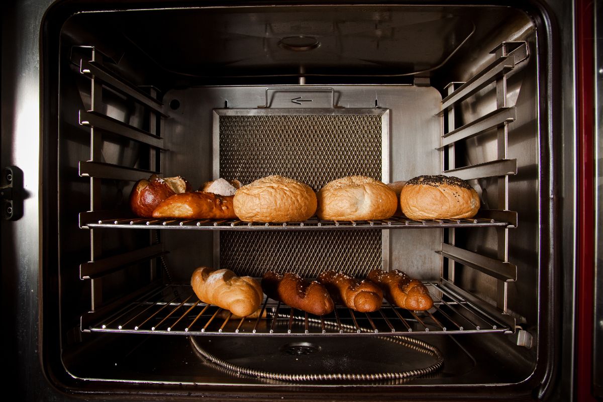 Loaves of bread and baguettes in oven