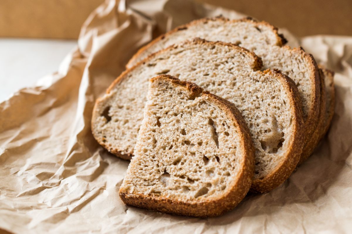 Slices of sourdough bread on paper bag