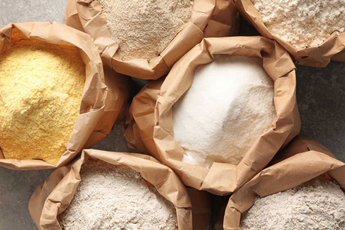 Different types of flour in paper bags