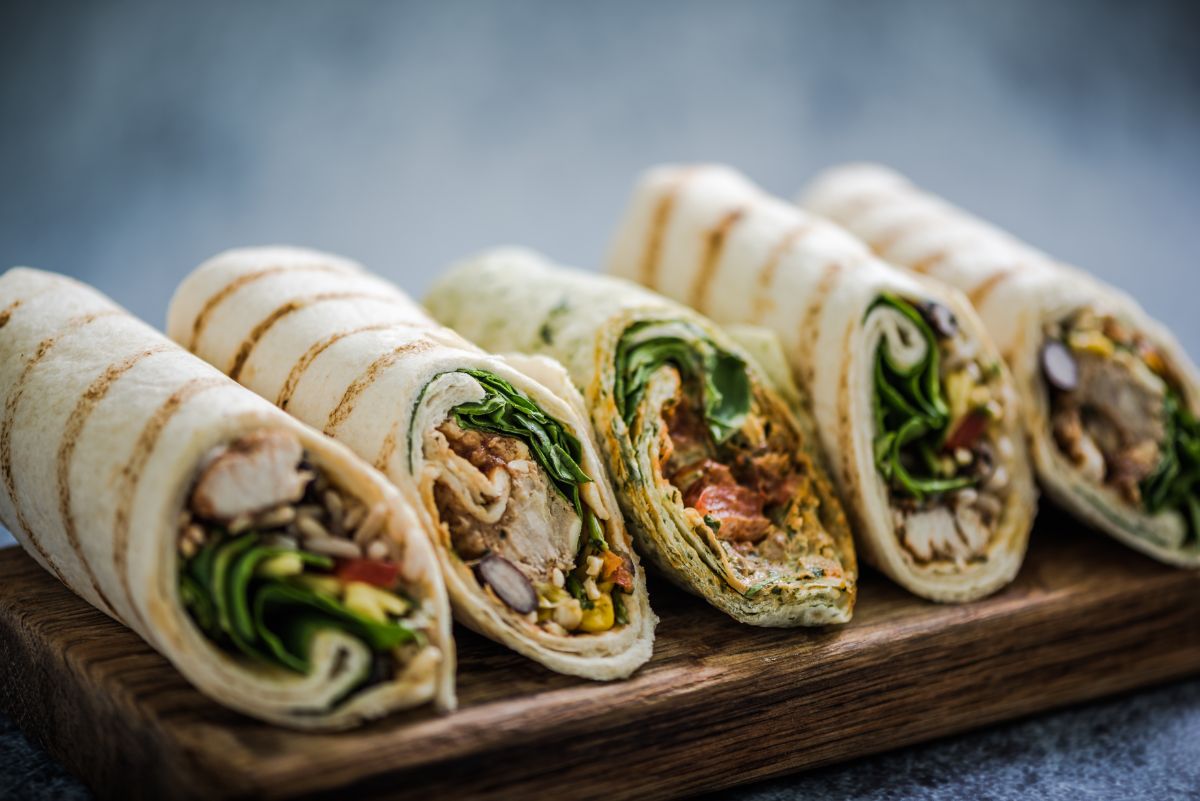 Healthy wraps on wooden pad